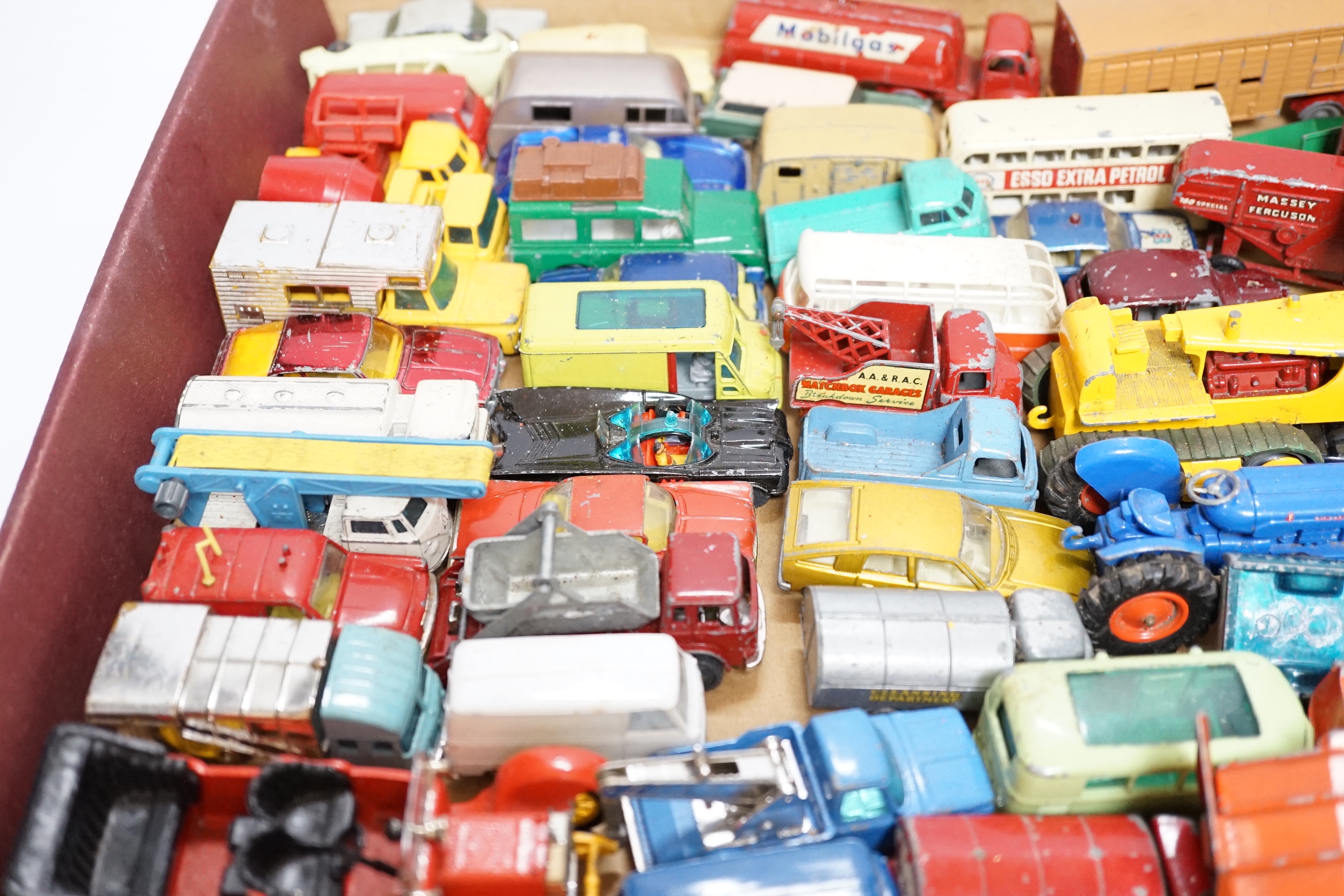 A collection of diecast vehicles by Corgi Toys, Dinky, Spot-On, Matchbox, etc. including 38, corgi toys; a Batmobile, a gold James Bond Aston Martin, a Man From UNCLE Oldsmobile, etc. 18 Husky Toys, ten Dinky Toys, etc.